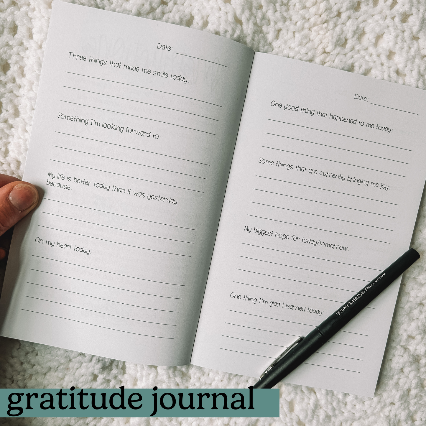 Two page spread of gratitude prompts. Date at the top and four prompts on each page.