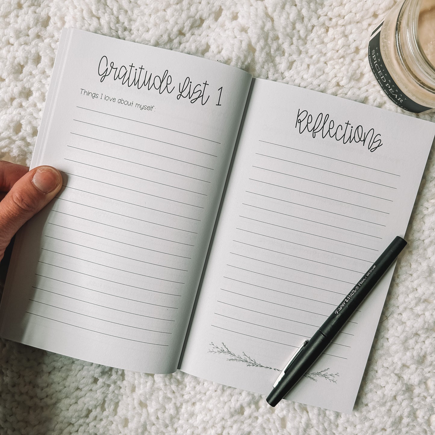 Gratitude list one is Things I love about myself with a full lined page. Opposite page is titled reflections with a full lined page.