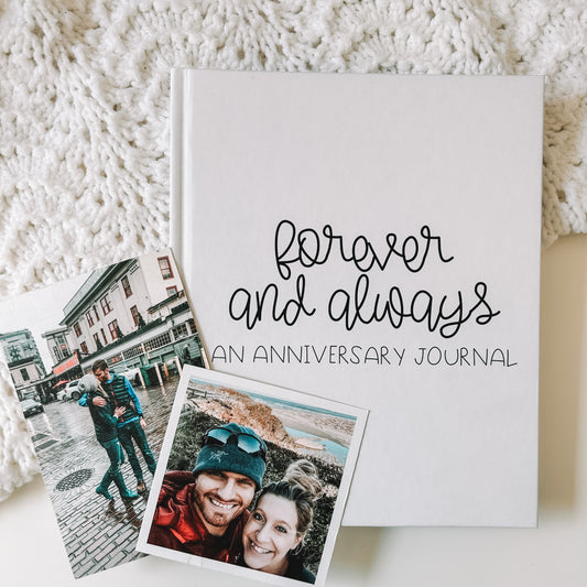 anniversary journal with  photos of a couple next to it