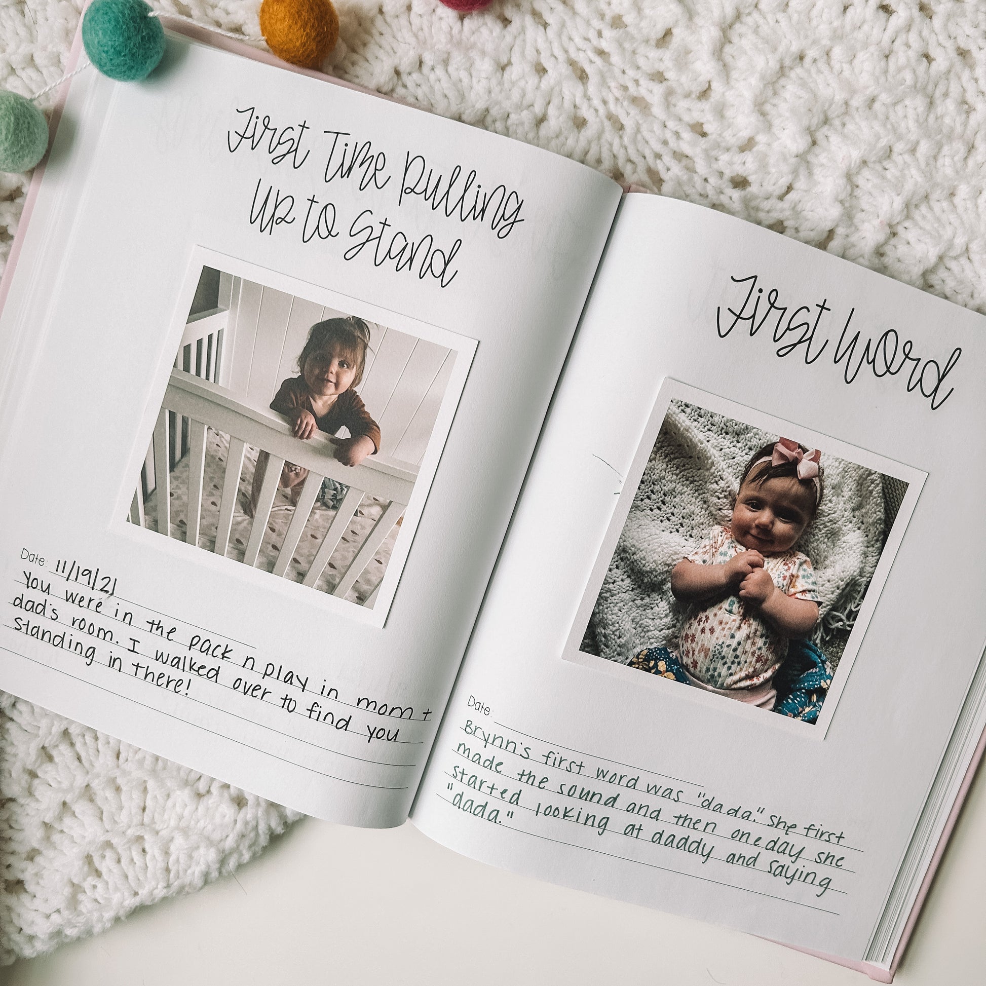 Baby firsts pages include a space for a photo, the date, and a few lines to write about the milestone. This two page spread is first time pulling up to stand and first word.