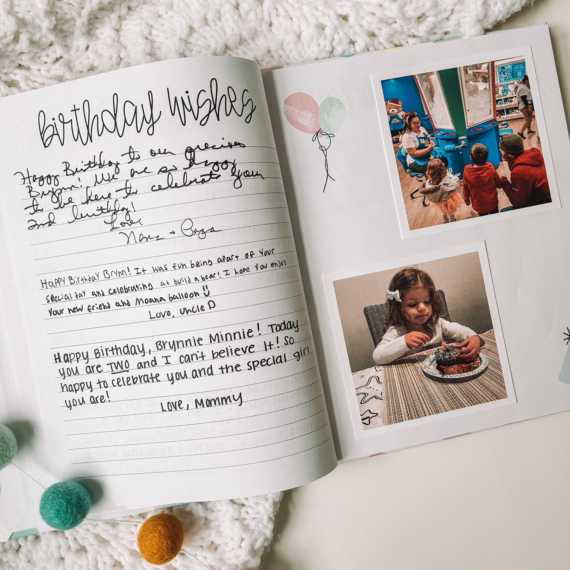 Two page spread featuring a lined page on the left titled Birthday Wishes with handwritten notes written in and two square phots on the right page.