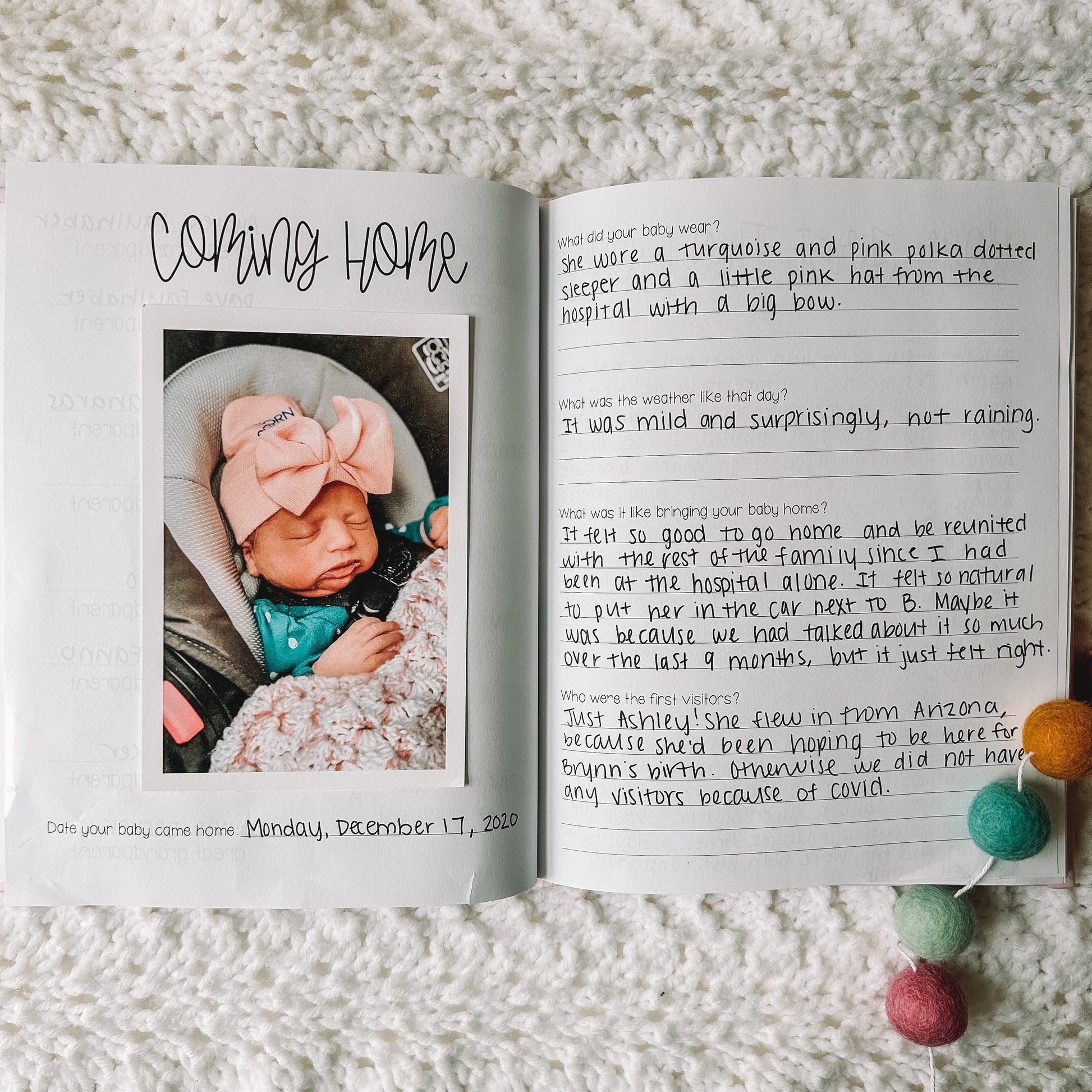 Two page spread about baby coming home includes a space for a picture and four prompts about the day.