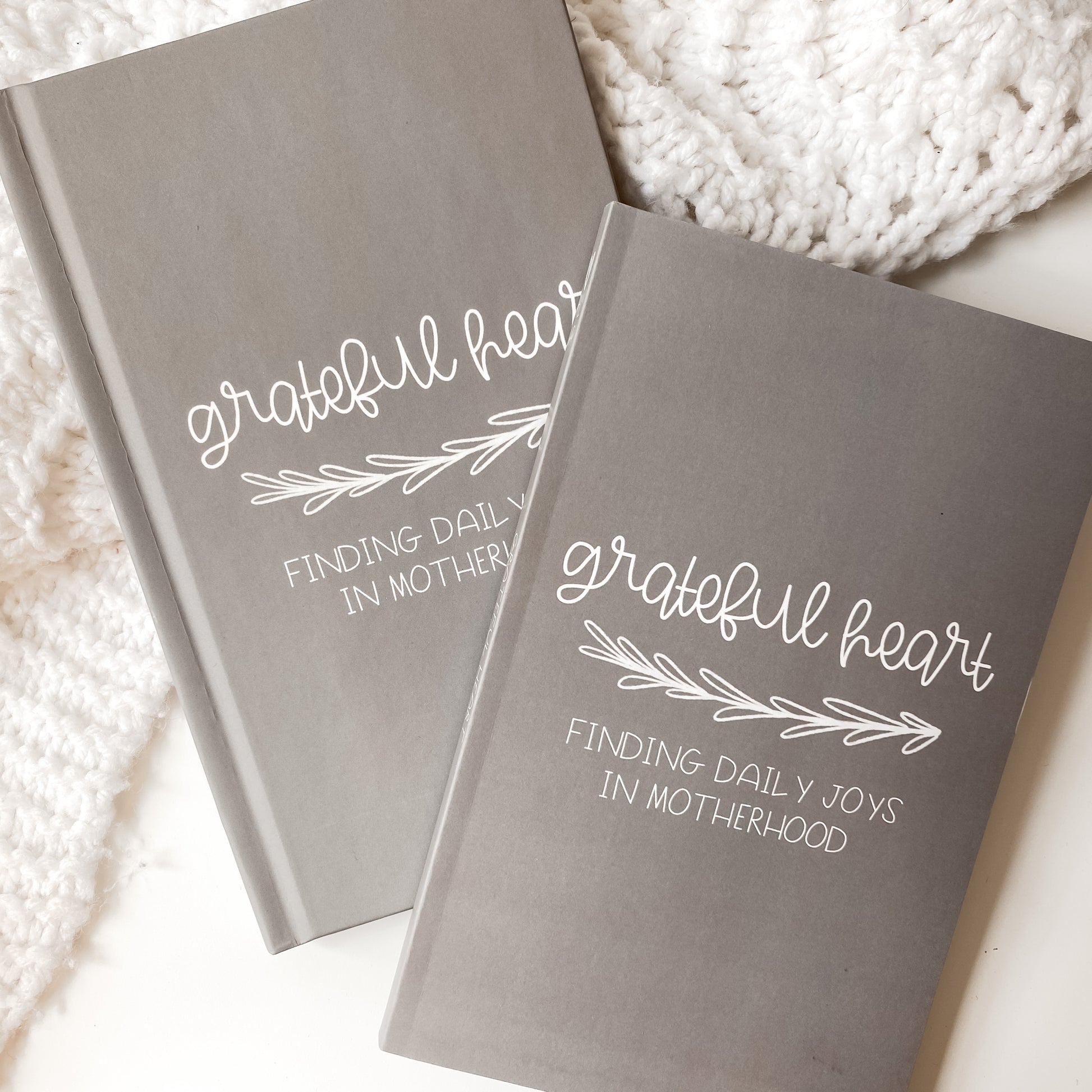 Grey gratitude journals in hardcover and paperback titled Grateful Heart Finding Daily Joys in Motherhood