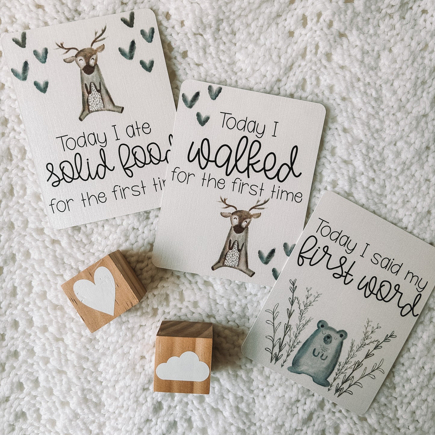 Today I ate solid food for the first time, today I walked for the first time, today I said my first word milestone cards with woodland animals above or below the text