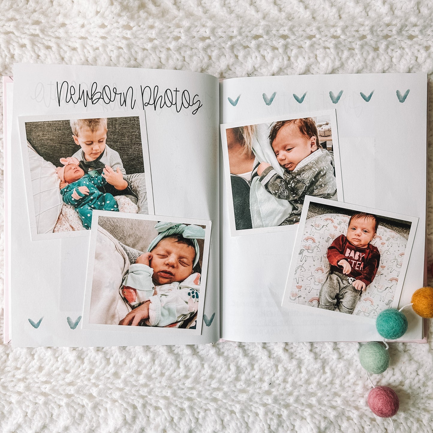 Two page blank spread titled Newborn Photos with two square photos on each page