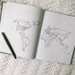 Travel journal includes a black and white map of the world that can be used to color or mark the places visited.