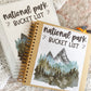 Two examples of the National Park Bucket List Journal printed. One is in a binder and the other is glued into a brown scrapbook.
