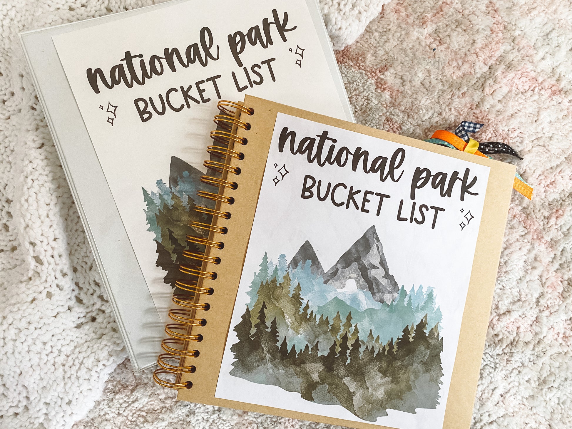 Two examples of the National Park Bucket List Journal printed. One is in a binder and the other is glued into a brown scrapbook.