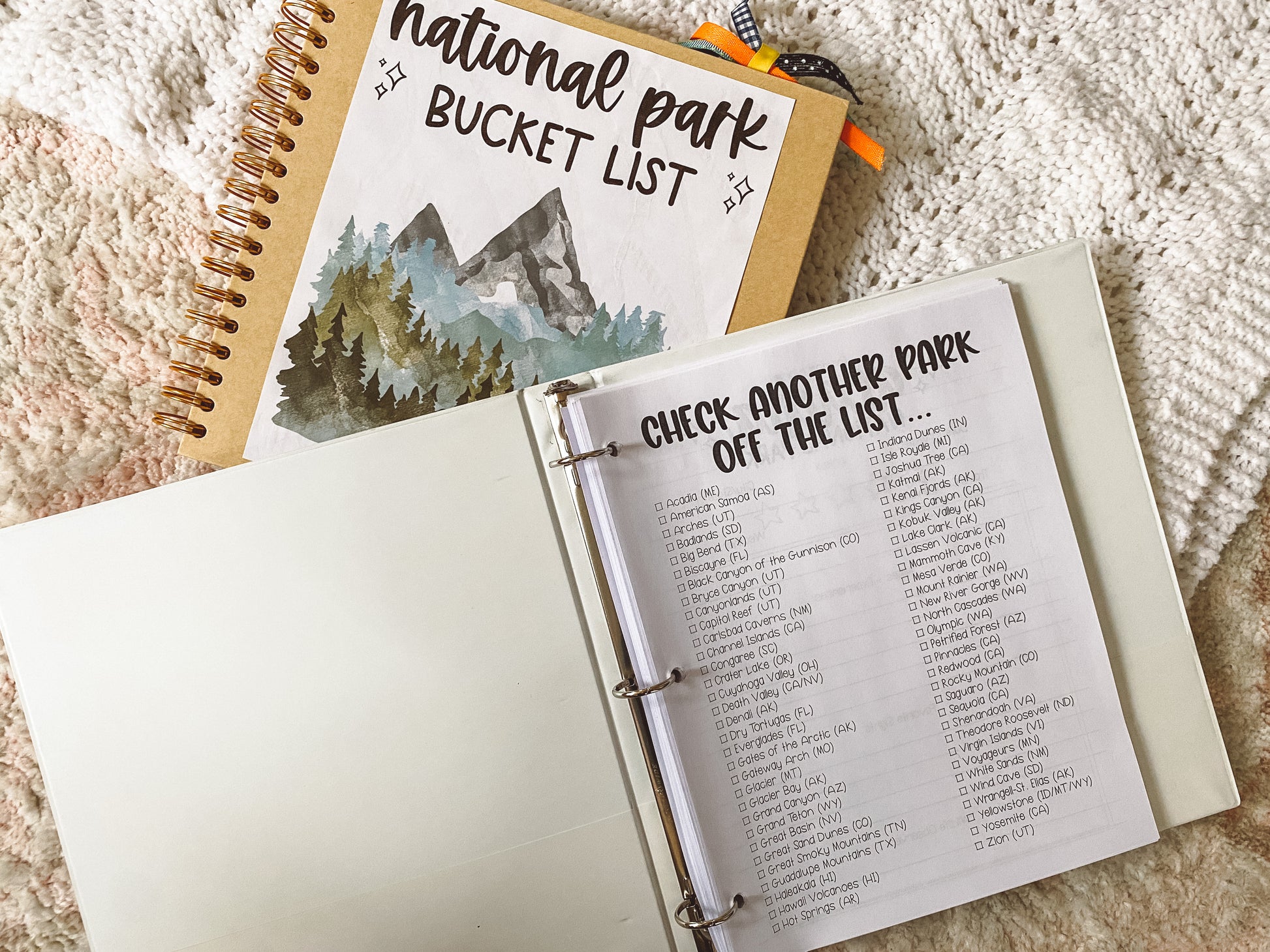 Interior of binder shows the National Parks checklist as the first page.